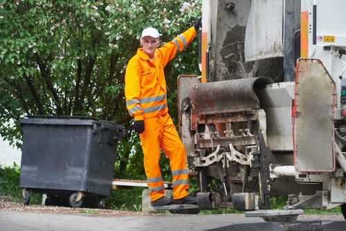 Bulky waste items being loaded for collection