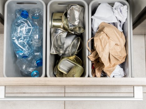 Recycling bins for paper, glass, metal, and plastic